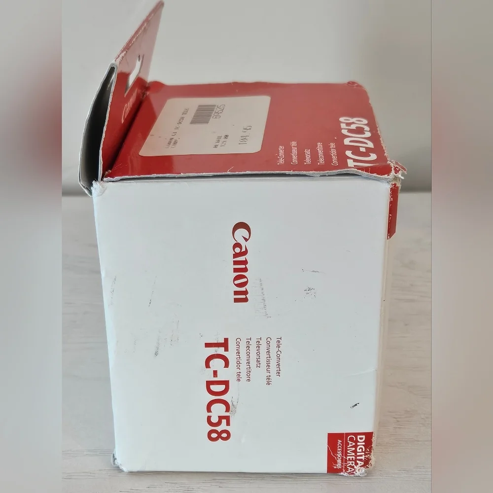 Canon Tele-Converter TC – DC58 1.5 X Condition: New Open Box